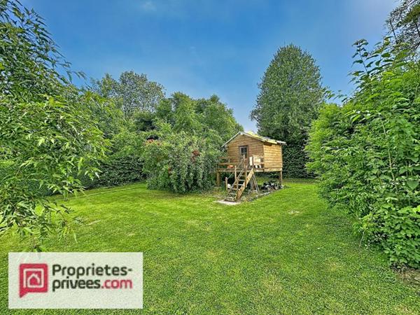 Maison familiale entre ville & campagne au bord d'un ruisseau protégé , à 5 minutes de Lisieux