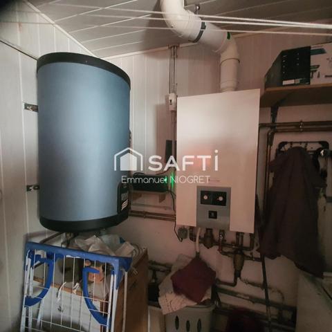 Maison de 98 m², 3 ch, espace de vie spacieux avec garage pour camping car