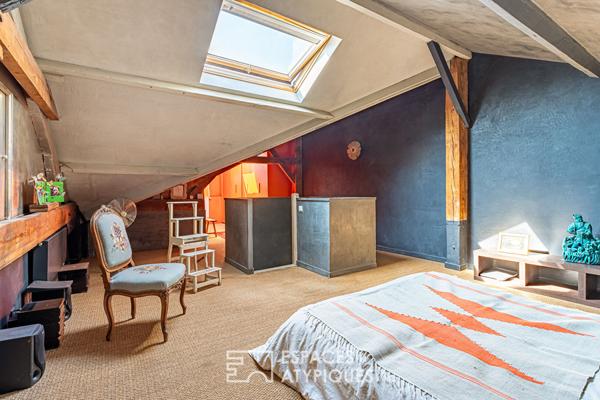 Ancienne biscuiterie réhabilitée en maison esprit atelier d’artiste au centre-sud de Malakoff