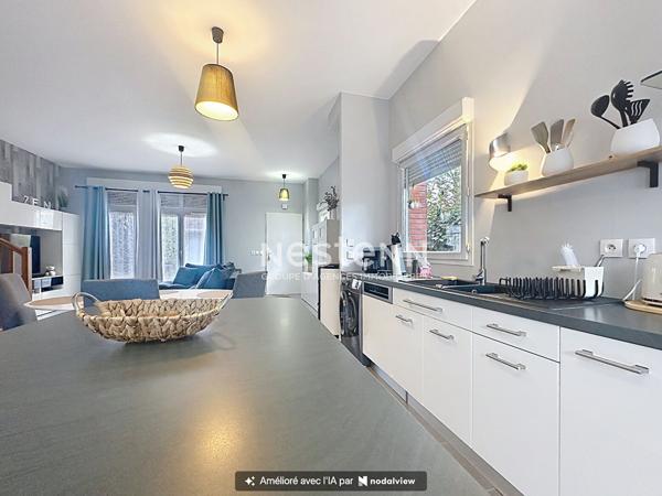 Maison à vendre 96 m² avec 3 chambres, centre-ville, garage, terrain