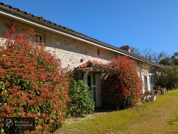 Calignac (47600) Propriété de caractère en pierre avec piscine et terrain autour de 4ha proche Nérac