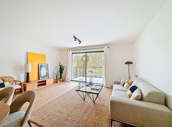 T3 de 75 m² avec balcon et stationnements sécurisés - à proximité du Parc Barbieux et des transports