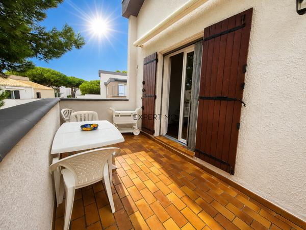 APPARTEMENT AVEC TERRASSE ET PARKING PRIVE