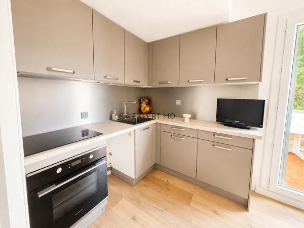 APPARTEMENT AVEC TERRASSE ET PARKING PRIVE