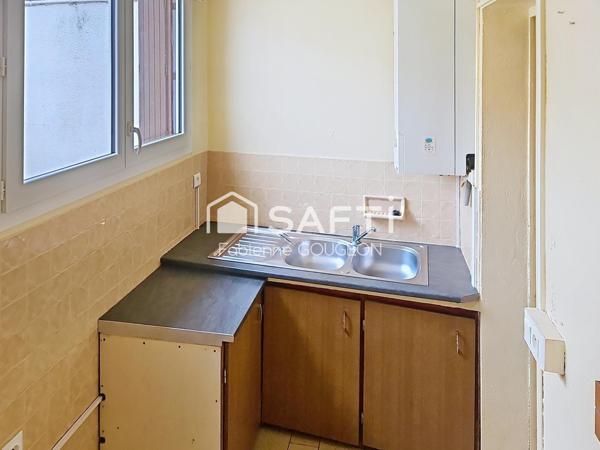 Maison de ville des années 20 , de 62 m² sur 130 m² de terrain deux chambres