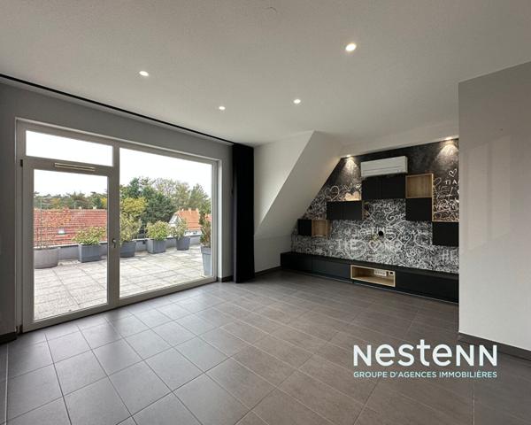 Attique d'exception avec terrasse de 60 m² et prestations haut de gamme