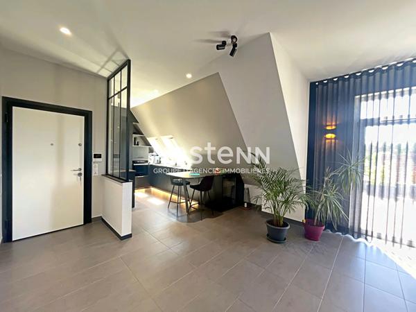 Attique d'exception avec terrasse de 60 m² et prestations haut de gamme