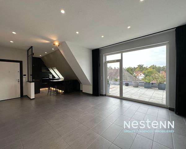Attique d'exception avec terrasse de 60 m² et prestations haut de gamme