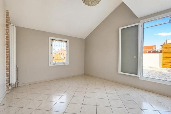 Appartement 3 pièces de 75 m² à Vauréal avec terrasse et box