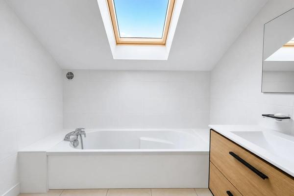 Appartement 3 pièces de 75 m² à Vauréal avec terrasse et box