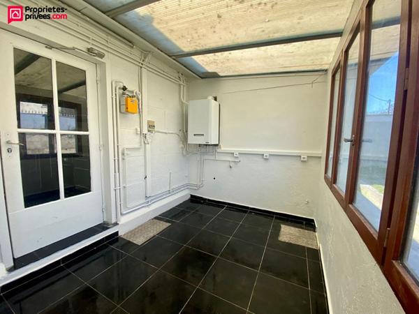 Maison de plain-pied cinq pièces trois chambres