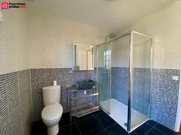 Maison de plain-pied cinq pièces trois chambres