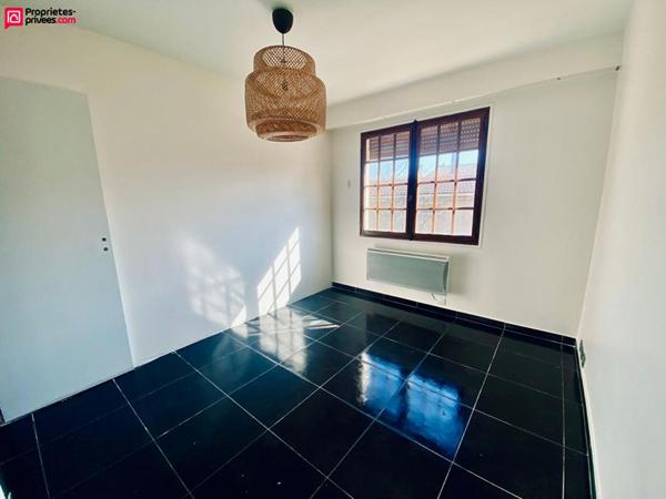 Maison de plain-pied cinq pièces trois chambres