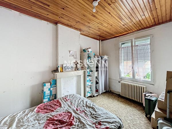 Maison individuelle d'environ 121m² à SOMAIN - Louée 700€ par mois HC - 2 chambres + 1 bureau - Garage - Grand jardin - 119.500€