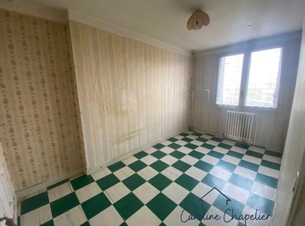 Maison cœur de ville de 95m², 4 chambres, garage, jardin, dépendances