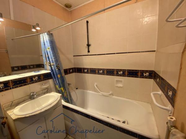 Maison cœur de ville de 95m², 4 chambres, garage, jardin, dépendances