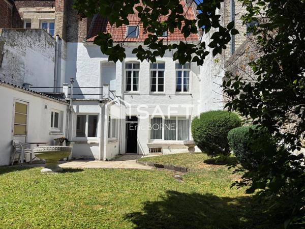Maison de maitre avec jardin en plein coeur de ville