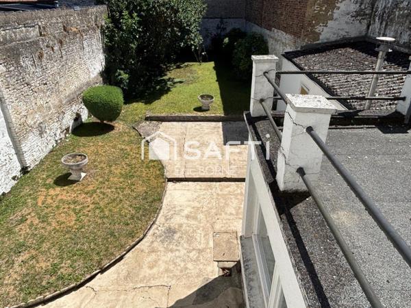 Maison de maitre avec jardin en plein coeur de ville