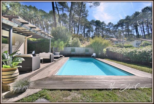 Maison à vendre VILLA 10 pièces de 225 m² SEIGNOSSE (40) Trois logements indépendants, cadre calme et verdoyant.