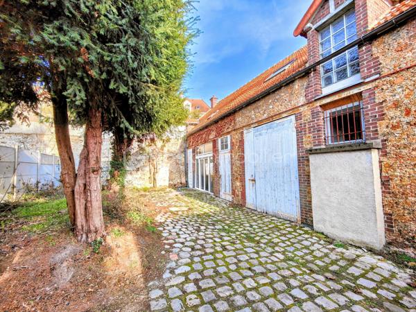 Immeuble de 210,19 m²