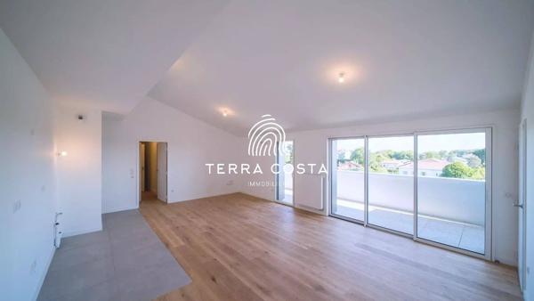 Appartement T3 Double garage / Terrasse et balcon