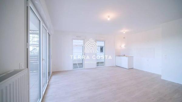 Appartement T3 Double garage / Terrasse et balcon