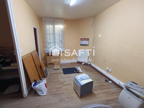 ancien local commercial, logement possible.