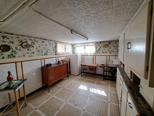 Pavillon plain-pied sur sous-sol surélevé avec grenier aménageable