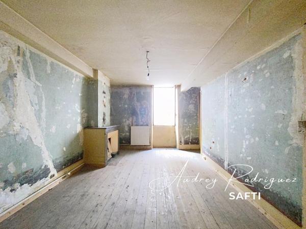 Centre-ville – Maison avec cour à rénover