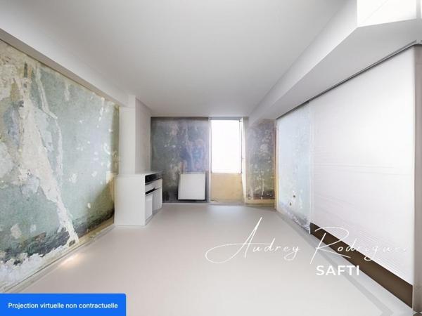 Centre-ville – Maison avec cour à rénover