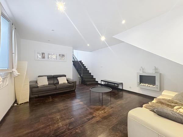 Charmant appartement en triplex avec garage