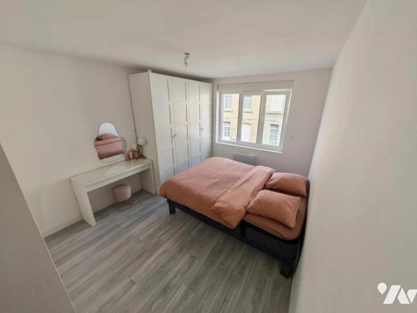 SAINT SAULVE IMMEUBLE COMPRENANT MAISON AVEC TERRAIN DEPENDANCES ET GARAGE 