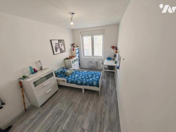 SAINT SAULVE IMMEUBLE COMPRENANT MAISON AVEC TERRAIN DEPENDANCES ET GARAGE 