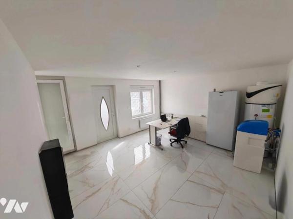 SAINT SAULVE IMMEUBLE COMPRENANT MAISON AVEC TERRAIN DEPENDANCES ET GARAGE 