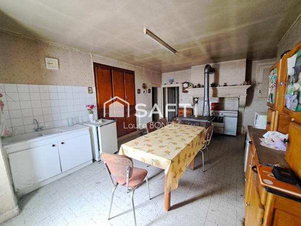 Maison à rénover avec dépendances et terrain