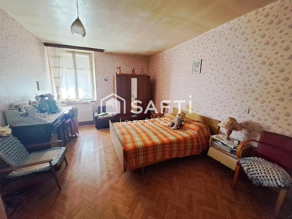 Maison à rénover avec dépendances et terrain