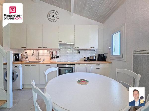 Maison 3 pièces 31 m2 avec terrasse couverte, jardin et place de parking