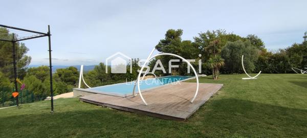 Villa charmante de 272m2 avec piscine mirroir dans un coin calme et forestier.