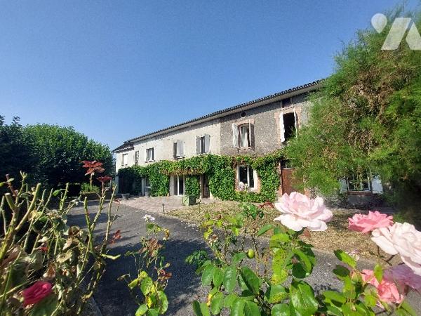 SAINT GAUDENS, ensemble immobilier constitué de trois logements sur un terrain de 1106 m².