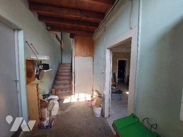 SAINT GAUDENS, ensemble immobilier constitué de trois logements sur un terrain de 1106 m².