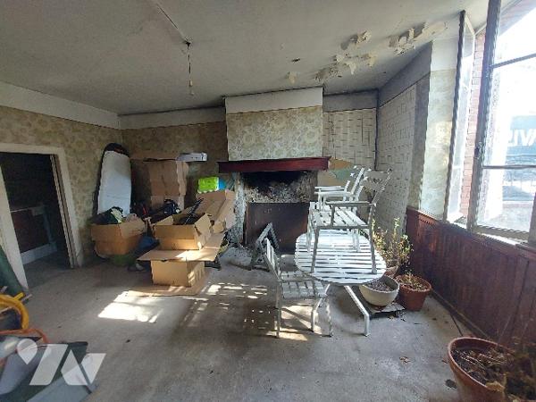 SAINT GAUDENS, ensemble immobilier constitué de trois logements sur un terrain de 1106 m².