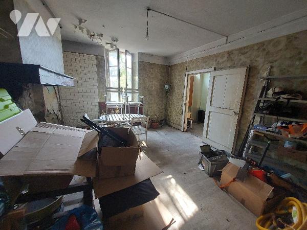 SAINT GAUDENS, ensemble immobilier constitué de trois logements sur un terrain de 1106 m².