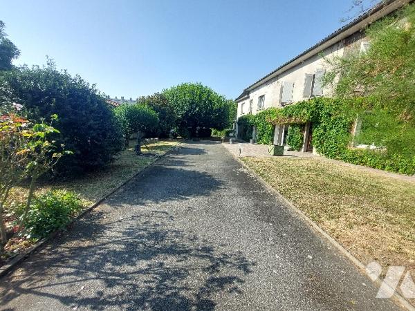 SAINT GAUDENS, ensemble immobilier constitué de trois logements sur un terrain de 1106 m².