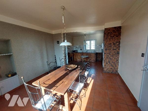 SAINT GAUDENS, ensemble immobilier constitué de trois logements sur un terrain de 1106 m².