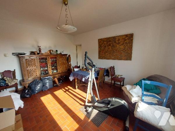 SAINT GAUDENS, ensemble immobilier constitué de trois logements sur un terrain de 1106 m².