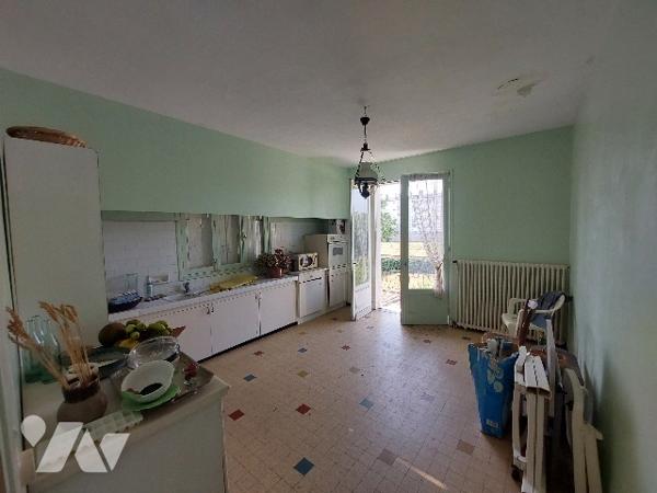 SAINT GAUDENS, ensemble immobilier constitué de trois logements sur un terrain de 1106 m².