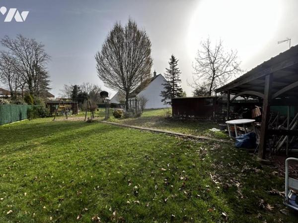 Maison familiale au calme, en impasse, avec double garage et jardin arboré