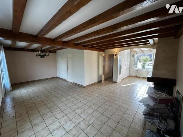 Maison familiale au calme, en impasse, avec double garage et jardin arboré