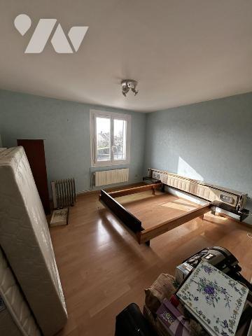 Maison familiale au calme, en impasse, avec double garage et jardin arboré