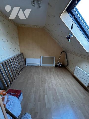 Maison familiale au calme, en impasse, avec double garage et jardin arboré